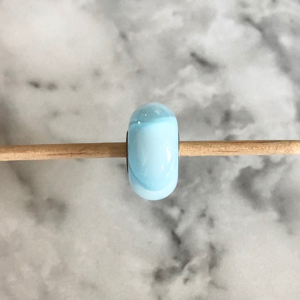 Light blue glass armadillo charm